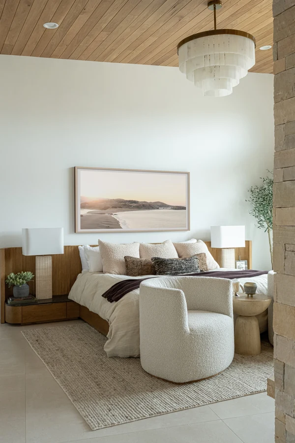 18 Above Bed Decor Ideas to Make Your Bedroom Feel Cozy and Stylish 2 Hang One Oversized Piece of Art as the Focal Point
