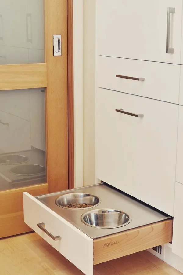 15 Cute Dog Room Ideas to Create a Cozy Space for Your Furry Friend 7 A Feeding Station Built Into a Low Cabinet