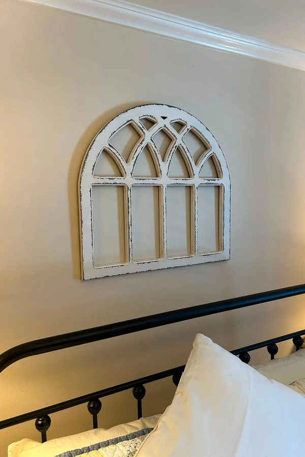 18 Above Bed Decor Ideas to Make Your Bedroom Feel Cozy and Stylish 12 Hang a Vintage Window Frame or Arch Panel