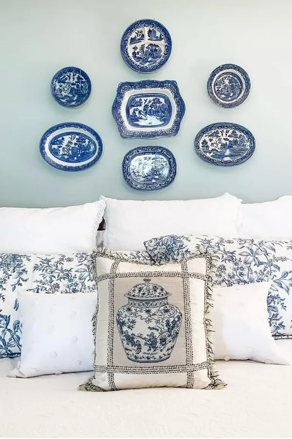 18 Above Bed Decor Ideas to Make Your Bedroom Feel Cozy and Stylish 18 Hang Decorative Plates as Wall Art