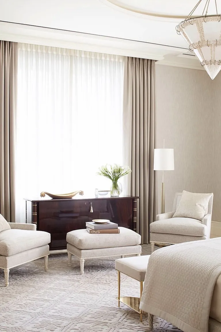 20 Renter-Friendly Bedroom Ideas for a Cozy Space Without Painting 8 Curtains hung high above a large bedroom window with sheer panels and long drapes in a rental bedroom