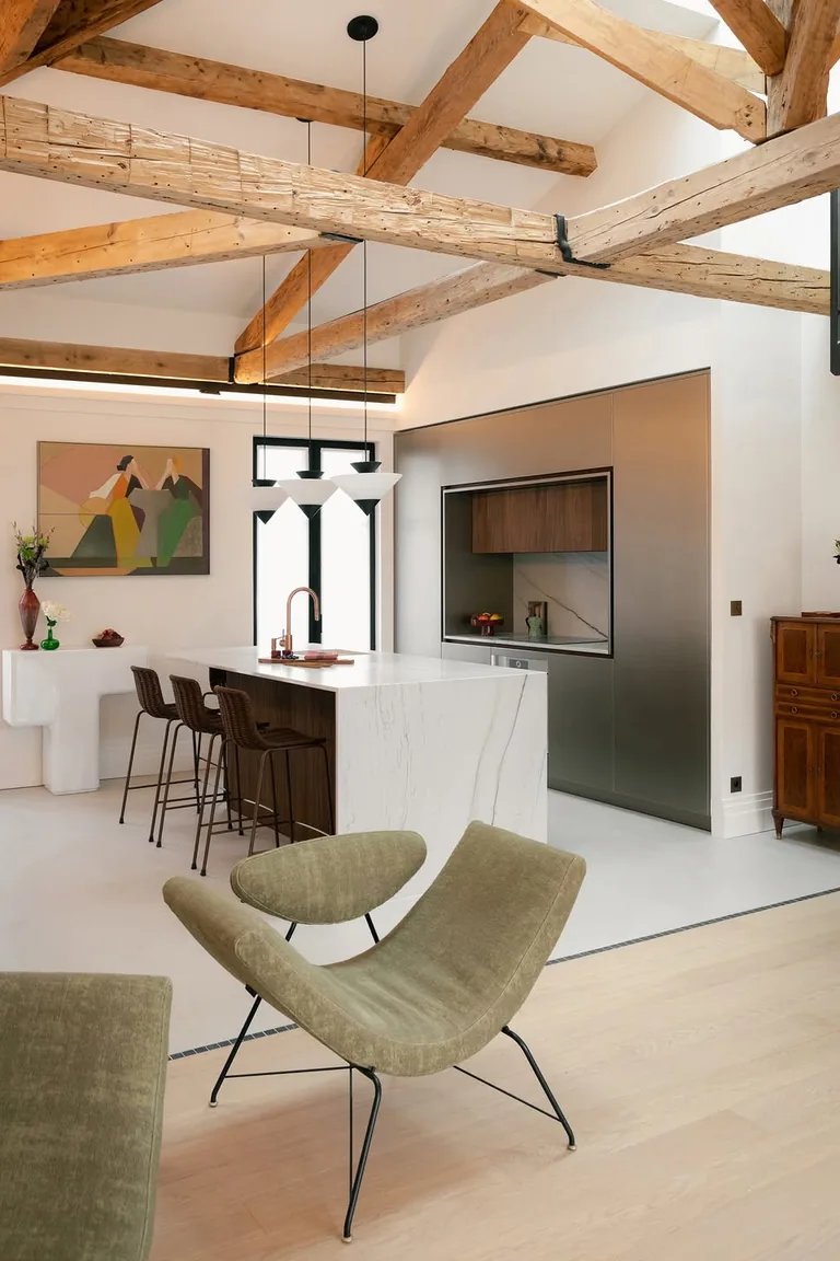 18 Small Kitchen Partition Ideas 9 Open plan kitchen and living area with exposed wood ceiling beams and pendant lights over an island