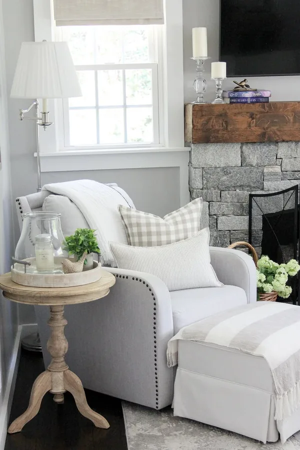 17 Empty Corner Living Room Ideas to Make Your Space Feel Complete 2 Angle a Single Accent Chair Toward the Sofa for a Reading Spot