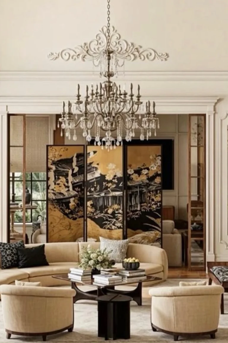 18 Small Kitchen Partition Ideas 18 Three-panel folding screen with gold and black artwork standing in a living room with a curved sofa