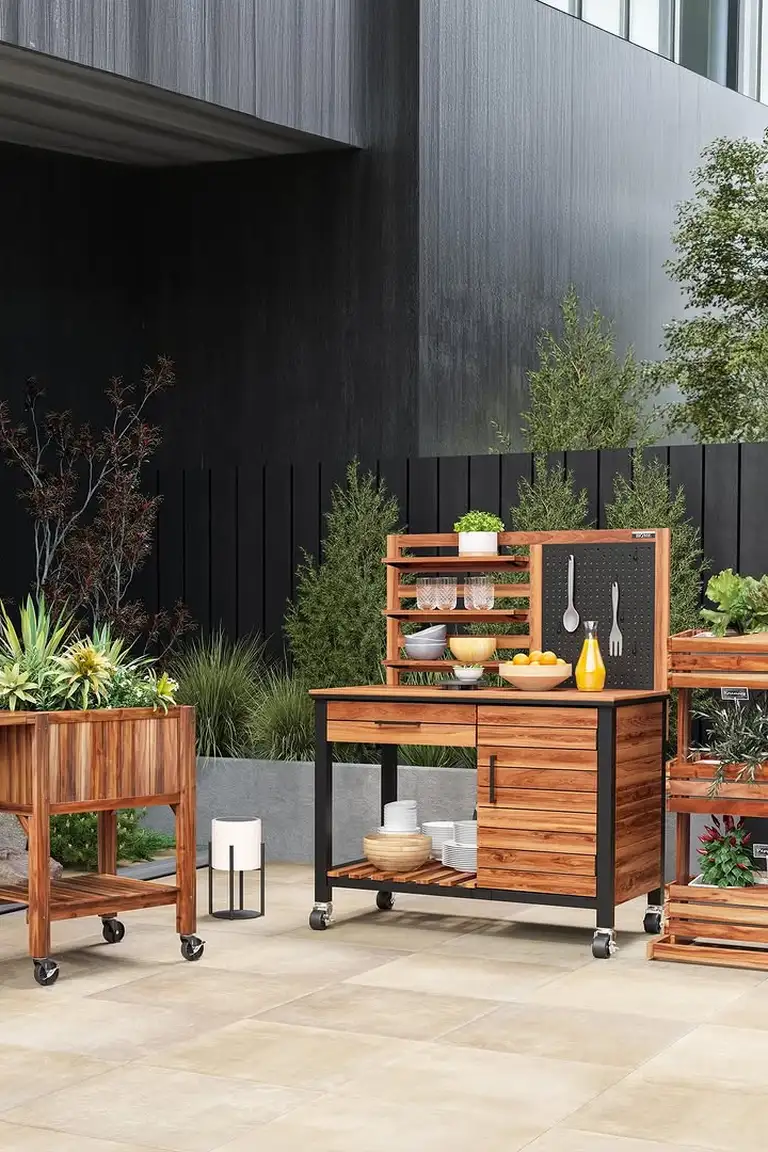 Rolling plant cart with potted plants on a small patio