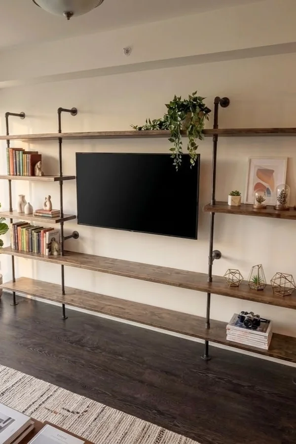 25 Creative DIY Shelf Ideas to Add Style and Storage to Your Home 5 Make Industrial Pipe Shelves for a Living Room